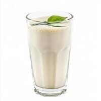 A glass of neer moru, with a refreshing drink made from buttermilk, ginger, and curry leaves, isolated on clean white background. photo