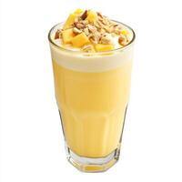 A glass of mango milkshake, with a creamy blend of mangoes, milk, and ice cream, garnished with chopped nuts, isolated on clean white background. photo