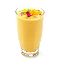 A smoothie with mango and other fruit in it photo