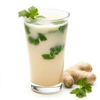 A glass of neer moru, with a refreshing drink made from buttermilk, ginger, and curry leaves, garnished with cilantro, isolated on clean white background. photo
