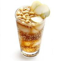 A close-up of a refreshing tuba, a sweet and bubbly drink made with fermented sap from the agave plant, garnished with peanuts and apple slices, served in a glass, isolated on clean white background. photo