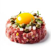 A finely presented image of a steak tartare, featuring raw ground beef mixed with capers, onions, and herbs, topped with a raw egg yolk. The steak tartare, with its bold flavors and delicate photo