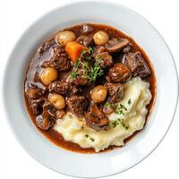 Beef stew with mashed potatoes and mushrooms photo
