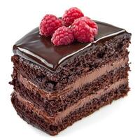 A close-up of a decadent chocolate cake, its layers rich and moist, topped with a glossy chocolate ganache and fresh raspberries. The cake, a symphony of chocolatey goodness, exudes a tempting aroma. photo