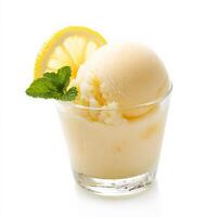 A close-up of a refreshing lemon sorbet, a light and tangy Italian dessert, made with lemon juice, sugar, and water, served in a glass and garnished with a lemon slice and a mint leaf, perfect for photo