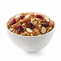 A bowl of homemade granola with rolled oats, almonds, dried cranberries, and honey-roasted nuts. Served with fresh yogurt for a healthy and crunchy breakfast. Isolated on clean white background photo