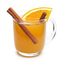 A rustic homemade apple cider in a clear mug, garnished with a cinnamon stick and a slice of orange. The warm, spiced drink gives off a cozy autumn vibe. Isolated on clean white background photo