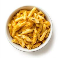 A bowl of classic American mac and cheese, elevated with the complex flavors of Indian butter chicken, featuring creamy macaroni pasta tossed in a rich tomato-based curry sauce with tender pieces of photo