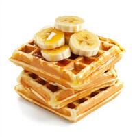 A stack of golden Belgian waffles with deep pockets, generously drizzled with honey and topped with sliced bananas. The waffles are crispy on the outside and fluffy inside, making for a mouthwatering photo