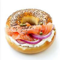 A traditional bagel with smoked salmon, cream cheese, capers, and red onion slices. The bagel is slightly toasted, adding a crunch to this classic breakfast sandwich. Isolated on clean white photo