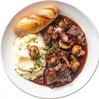 A decadent and rich beef Bourguignon, beef braised in red wine with mushrooms, pearl onions, and bacon, served with creamy mashed potatoes and a side of crusty baguette, a hearty and comforting dish, photo