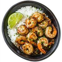 A sizzling plate of garlic butter shrimp, served with a side of fluffy jasmine rice and a wedge of lime. The shrimp are plump and perfectly seasoned. Isolated on clean white background photo
