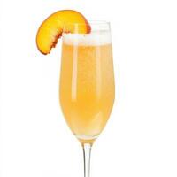 A glass of champagne with a peach slice on top photo