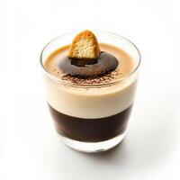 A close-up of a delicate panna cotta with espresso, a smooth and creamy Italian dessert, flavored with vanilla and topped with a shot of strong espresso, served in a small glass and garnished with a biscotto, isolated on clean white background. photo