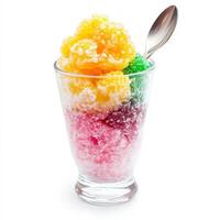 A close-up of a colorful granita dessert, a semi-frozen dessert made from sugar, water, and various flavorings, such as lemon, coffee, or almond, served in a glass and garnished with a spoon, perfect for a hot day, isolated on clean white background. photo