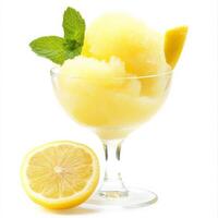 A close-up of a refreshing lemon sorbet, a light and tangy Italian dessert, made with lemon juice, sugar, and water, served in a glass and garnished with a lemon slice and a mint leaf, perfect for cleansing the palate, isolated on clean white background. photo