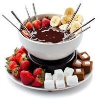 A chocolate fondue with strawberries and marshmallows photo