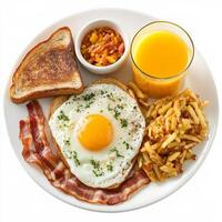 A plate of food with eggs, bacon, and toast photo