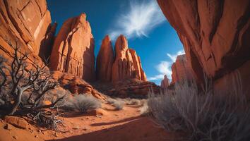 Exploring Red Rock Formations Under Blue Sky in Desert Landscape photo