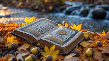 Open Book with Arabic Text on Fall Leaves and Acorns photo