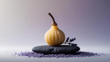 Relaxing Still Life with Yellow Gourd, Stone, and Lavender photo