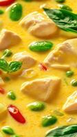 Chicken simmered in golden sauce with peas and basil, food blog background, top view photo
