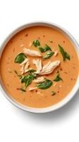 Chicken soup with spinach in a bowl, with spices. Healthy dish for cold weather photo