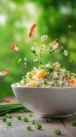 Creamy salad with bacon and chives is levitating above the table for an appetizer menu ad photo