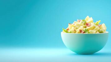 Fresh potato salad in bowl on plain background. For recipe blogs, food product marketing photo