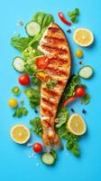 Grilled fish fillet with fresh vegetables. Meal preparation, nutrition concept photo