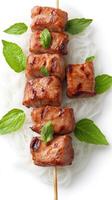 Grilled beef kebab with basil leaves on noodles for lunch, a tasty, and fresh diet meal photo
