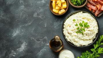 Mashed potatoes meal with bacon and sauce on table ideal for food blog recipes photo