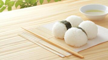 Onigiri with tea served on table, a staple food displayed against leaf foliage, for dietary menu photo