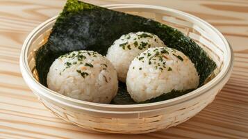 Onigiri in basket Rice balls with nori background, suitable for cuisine or food blog use photo
