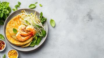 Pancake with shrimp and sprouts, viewed from above, on a light background for advertising photo