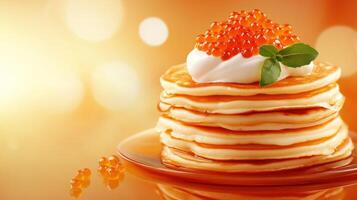 Pancakes topped with cream and caviar on a plate with bright bokeh background for a food presentation photo