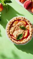 Peach pie, overhead view, on light green, for food blogs, recipe websites, food content photo