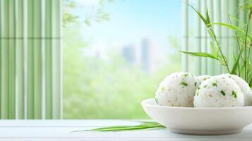 Rice balls in bowl on table, with window, for presentation or as a blog banner photo