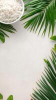 Rice in bowl with leaves background for product placement, cooking recipe website photo