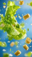 Salad ingredients flying up on a blue background. Use in a cooking blog or recipe photo