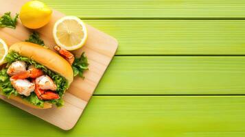 Shrimp roll with lemon on a green table. Appetizing seafood dish for a quick lunch photo