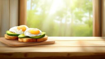 Sunny breakfast Avocado toast with eggs on wooden table by window with blurred garden background photo