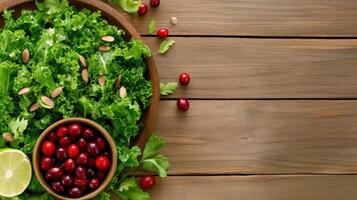 Top-down view of a kale and cranberry salad on a wooden surface for health and wellness content photo