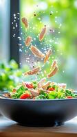 Tossed salad with greens, tomatoes, and chicken. Outside background setting. Food photography photo