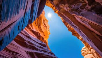 Looking Up Through Canyon Walls with Bright Sky and Sunlight photo