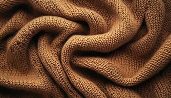 Top View Of Brown Knitted Fabric Used As Ure, Showcasing The Intricate Texture And Design Of The Material From Above photo