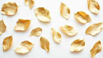 Top View Of Numerous Edible Gold Leaf Pieces On White Surface. A Luxurious And Exquisite Display Of Culinary Elegance photo