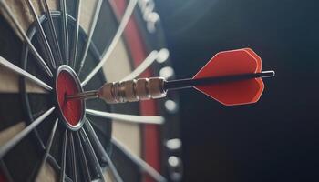 Perfect Aim. A Dart Hitting The Bullseye In The Middle Of The Dartboard With Precision And Accuracy In A Game Of Darts photo