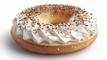 A bagel with cream and sesame seeds on top photo