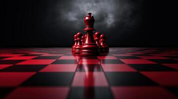 A red chess piece stands in front of a black background photo